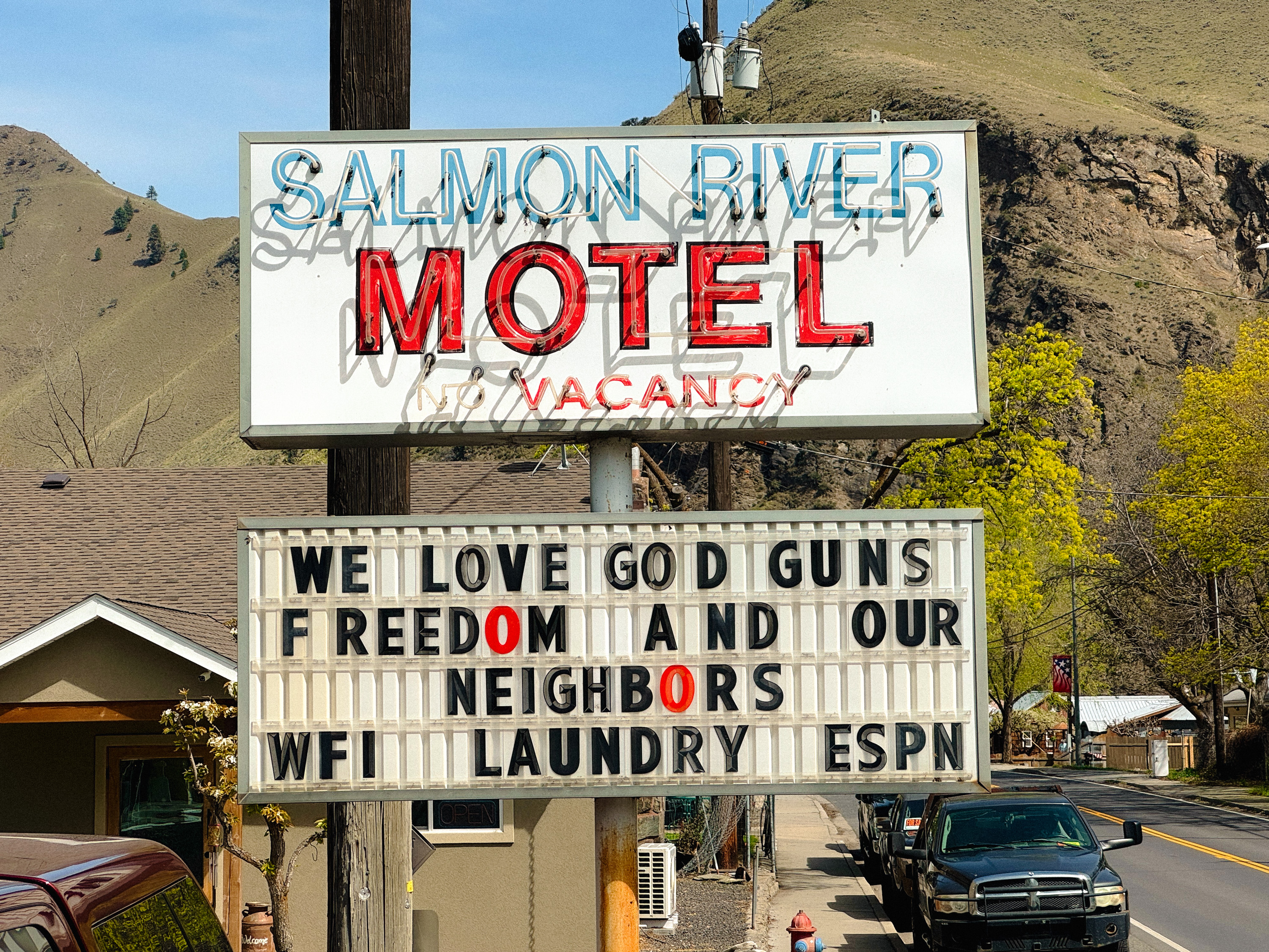 Salmon River Motel sign photographed during daylight in Riggins, Idaho.